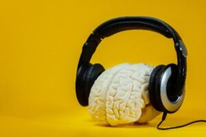 Brain Wearing Headphones