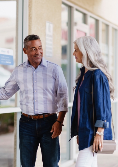 Beltone employee guiding customer on an office tour