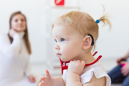 Child with Hearing Aid