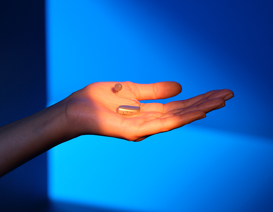 beltone illuminate hearing aid in hand